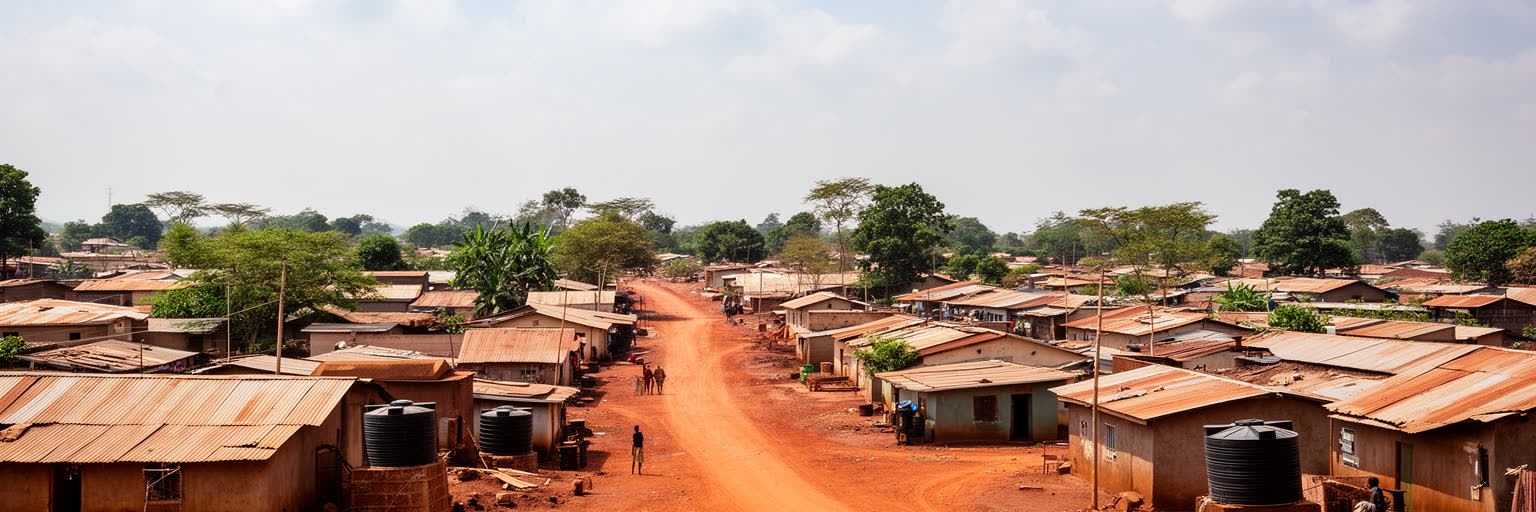 ジュバの住宅地、未舗装道路、土地開発を表す画像